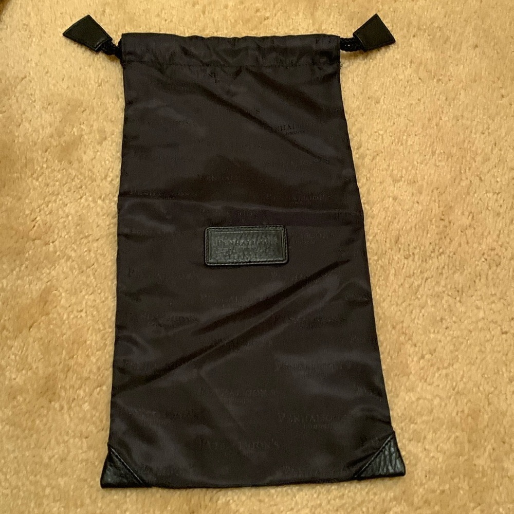Penhaligon dust bag with corded leather tabbed pulls